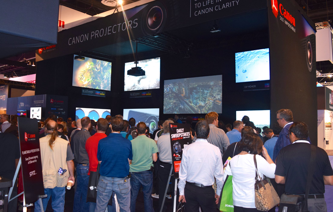 The Canon booth busy when demoing their projectors.