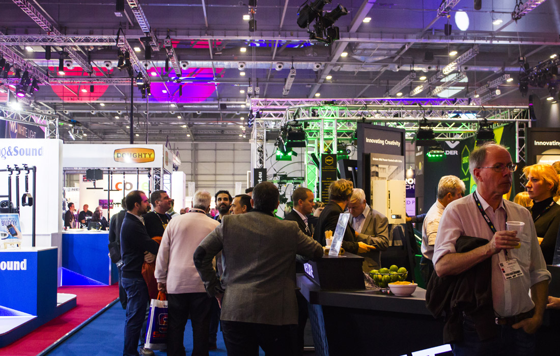 Visitors surrounding the ETC Stand and Innovation Gallery.